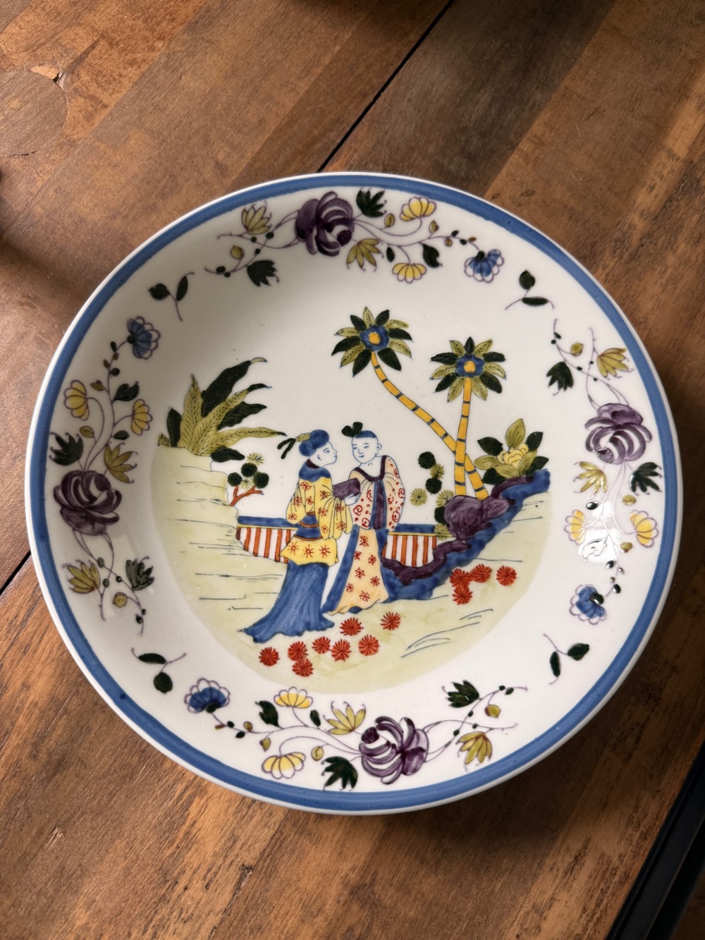 Hand-Painted Decorative Porcelain Plate with Asian Figure Scene